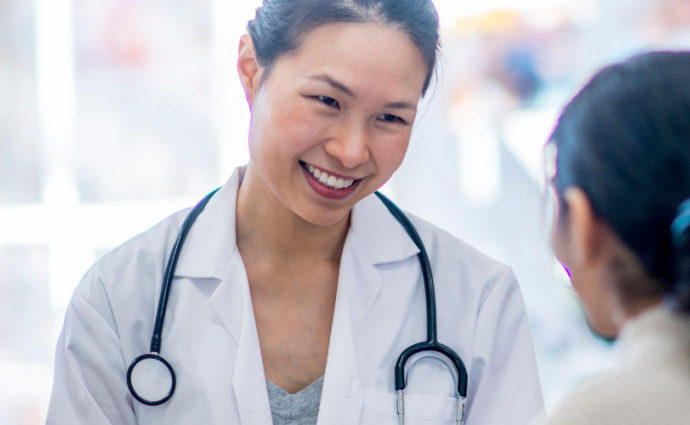 Doctor speaking with patient